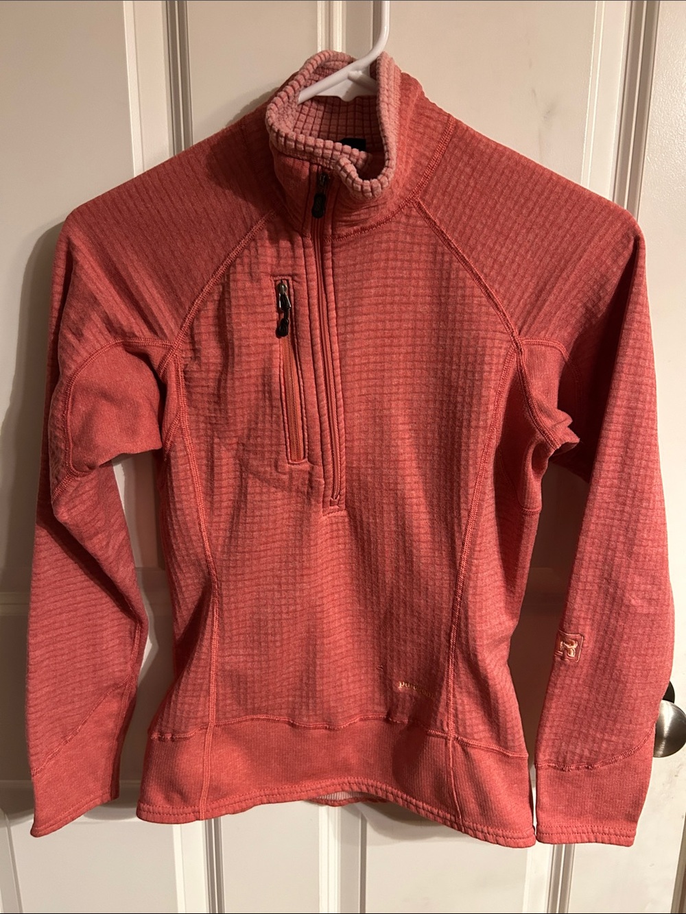 Patagonia Coral Waffle-Knit Half-Zip Women's Sweater small hole near bottom logo